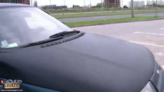 Curly haired babe with perfect ass is sucking his penis in the car